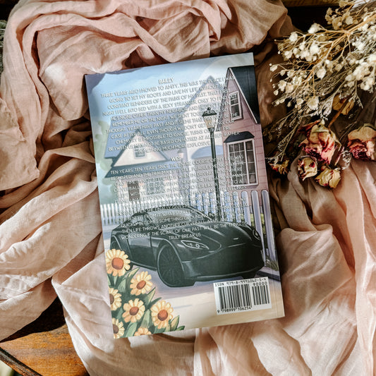 Book titled 'Years of You' by Madi Danielle with a couple and dogs on the cover, surrounded by pink fabric and flowers.