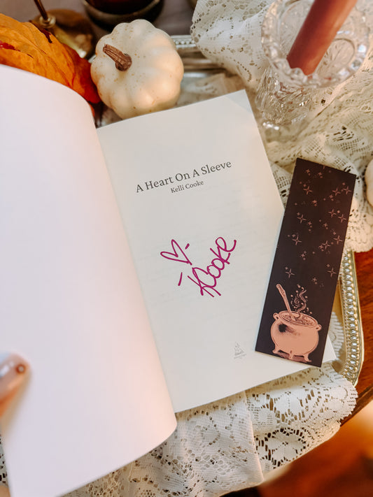 A Heart On A Sleeve
by Kelli Cooke SIGNED