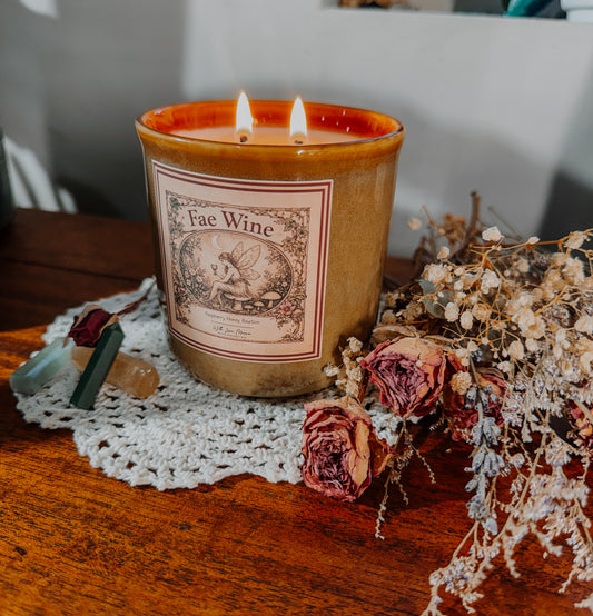 Fae wine candle with love Meena