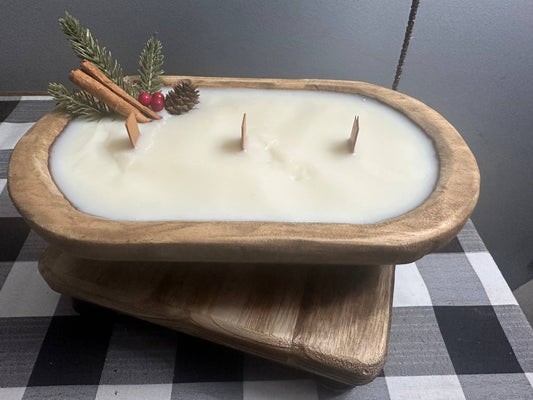 Decorative candle with a red and white striped bow on a checkered tablecloth doughbowl candle with love Meena