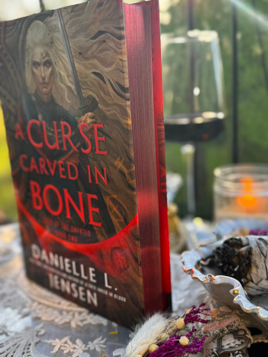 A Curse Carved in Bone by Danielle L. Jensen