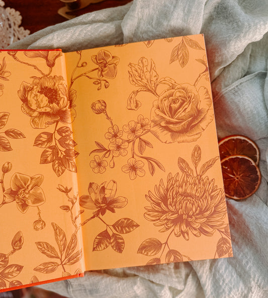 Book titled 'Phantasma' by Kaylie Smith on a textured surface with decorative elements. Deluxe limited edition