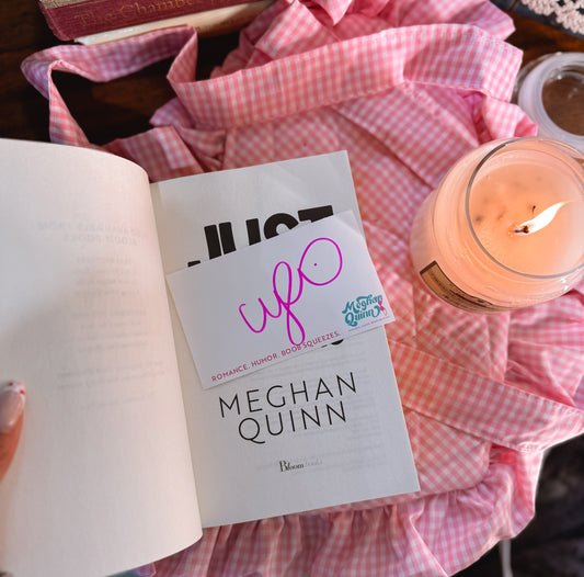 Just for the cameras by Megan Quinn. 