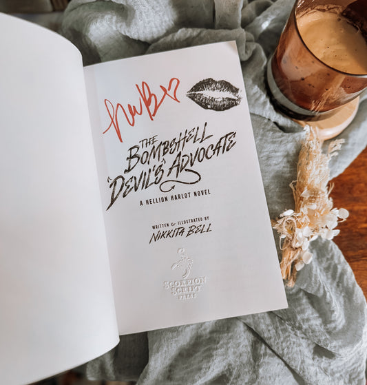 The Bombshell Devil's Advocate By: Nikkita Bell SIGNED