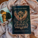 Book titled 'Human Reborn' by Aryn Eleven Shaw on a soft fabric background