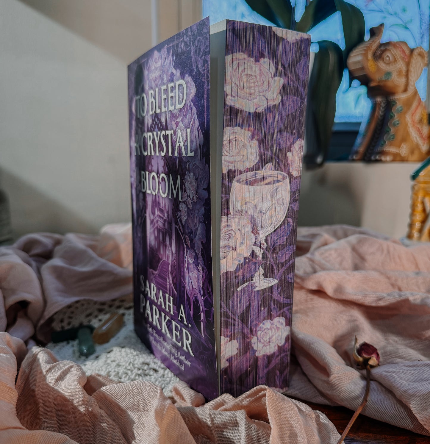 To Bleed a Crystal Bloom By: Sarah A. Parker