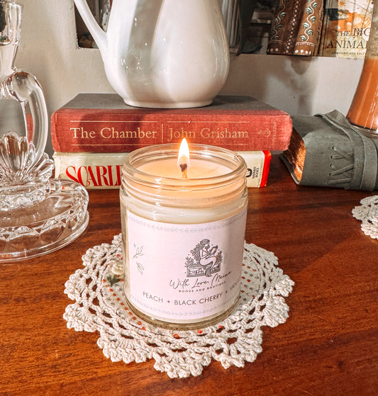 With love Meena signature candle. Peach black cherry and vanilla 