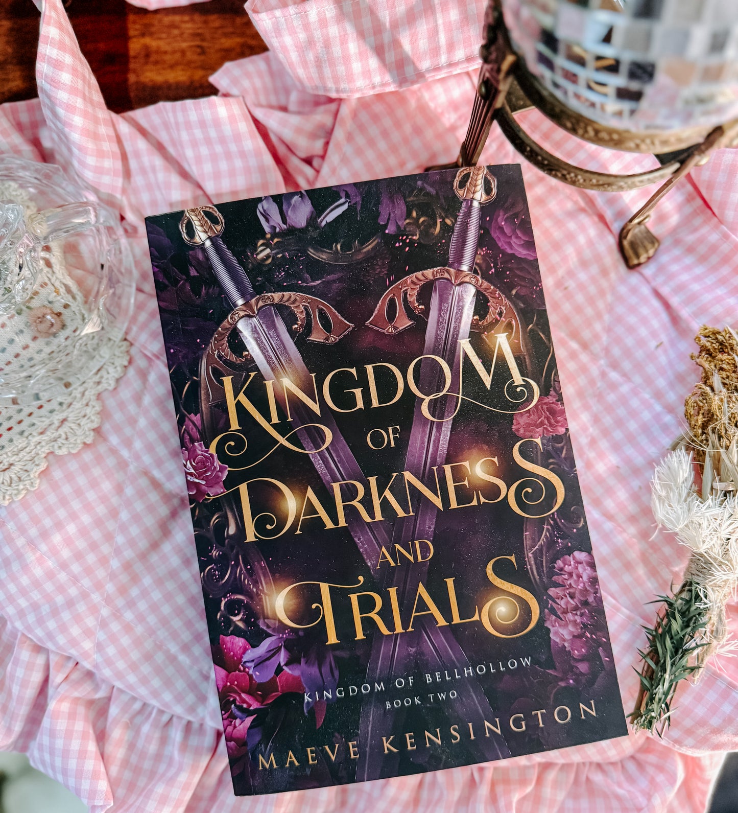 Kingdom of Darkness and Trials By: Maeve Kensington
SIGNED