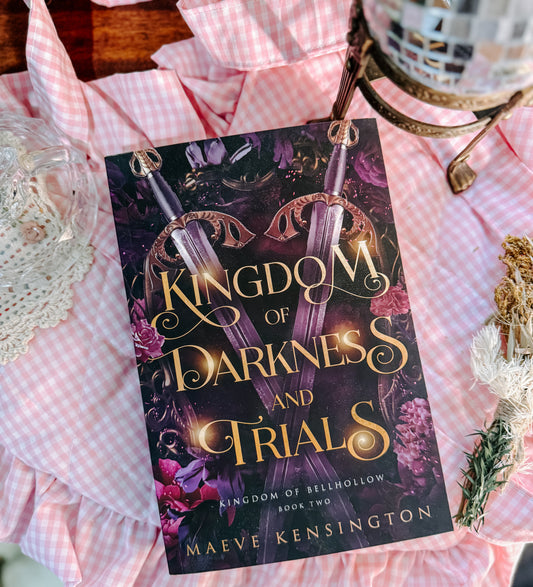 Kingdom of Darkness and Trials By: Maeve Kensington
SIGNED