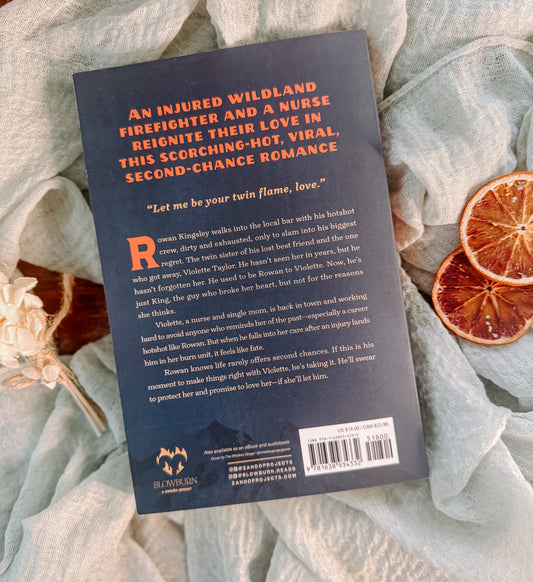 Book cover of 'PROTECT' by Paisley Hope with a firefighter holding an axe on a textured fabric background.